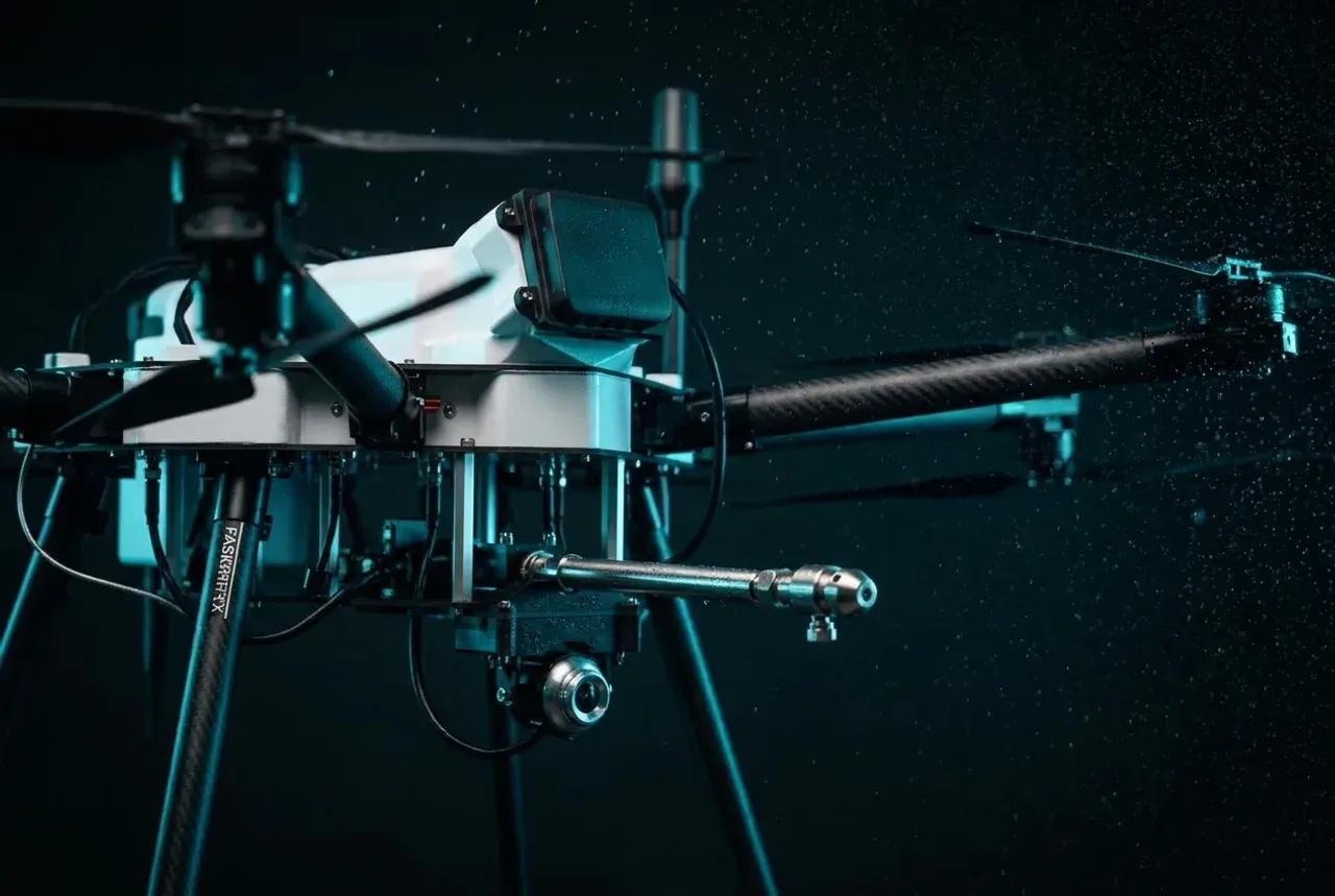 Close-up of the Sherpa industrial cleaning drone and its spray nozzle